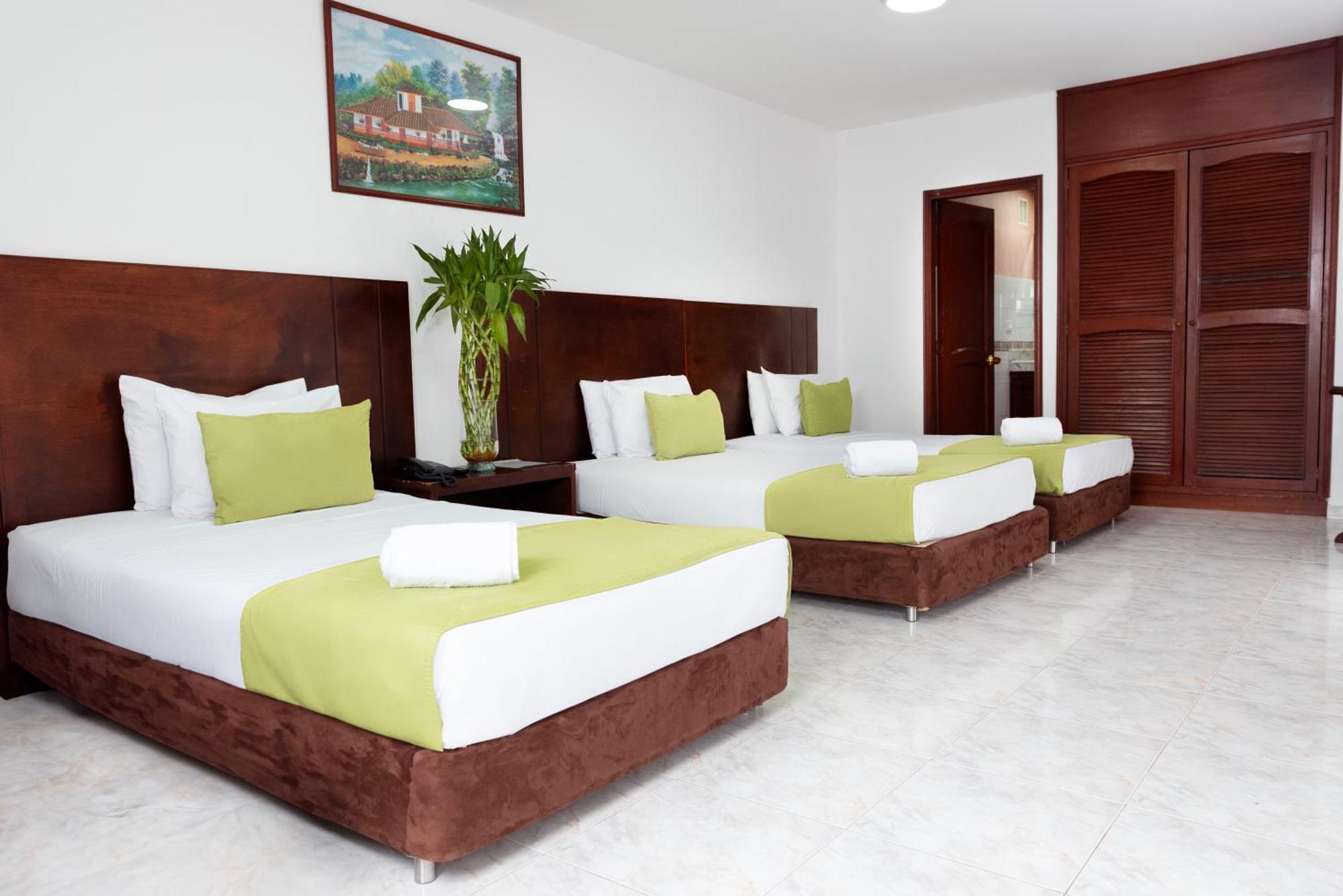 Tama Hotel Granada Real Cali Esterno foto