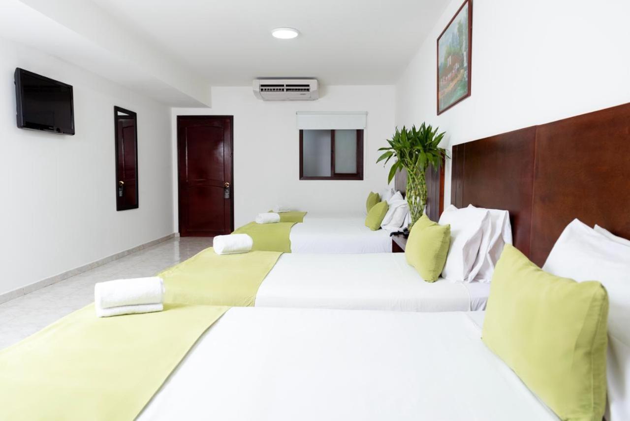Tama Hotel Granada Real Cali Esterno foto